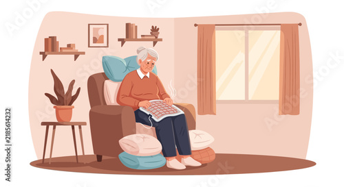 Elderly Woman Comfortably Seated Indoors Using Heating Pad