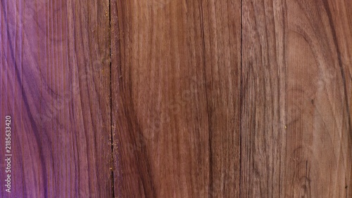 фотографія a close-up, textured view of several vertical wooden planks arranged side by side