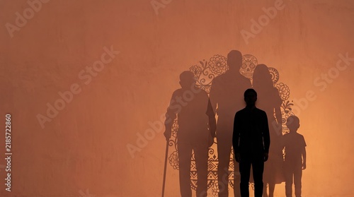 Family shadows silhouette on a warm orange wall representing ancestors and lineage