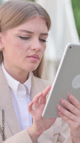 Outdoor Young Businesswoman Browsing internet on Tablet, Vertical Video