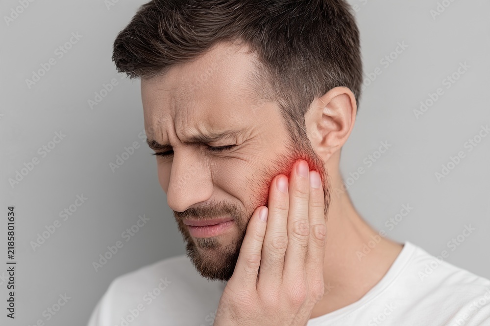 Fototapeta premium Young Man Suffering From Wisdom Tooth Pain