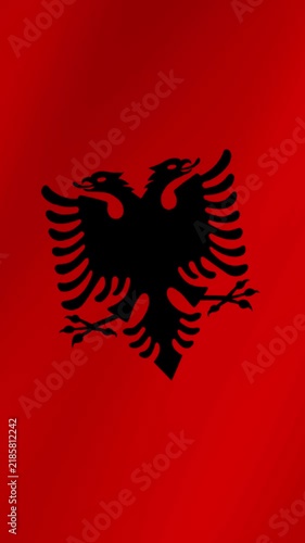 Albanian national flag waving in the wind. Detailed and high-quality fabric texture animation representing patriotism and national pride.