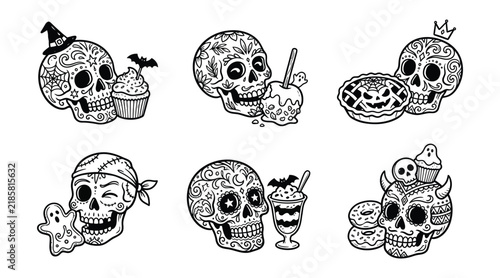 Set of sugar skulls with halloween treats