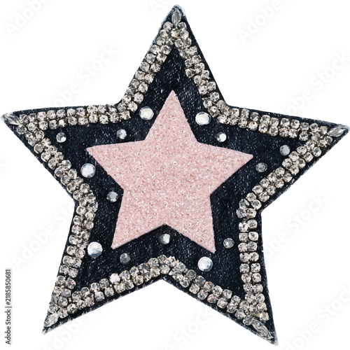 Fotografie Pink glitter star embellishment on dark material, shimmering with sparkling rhin