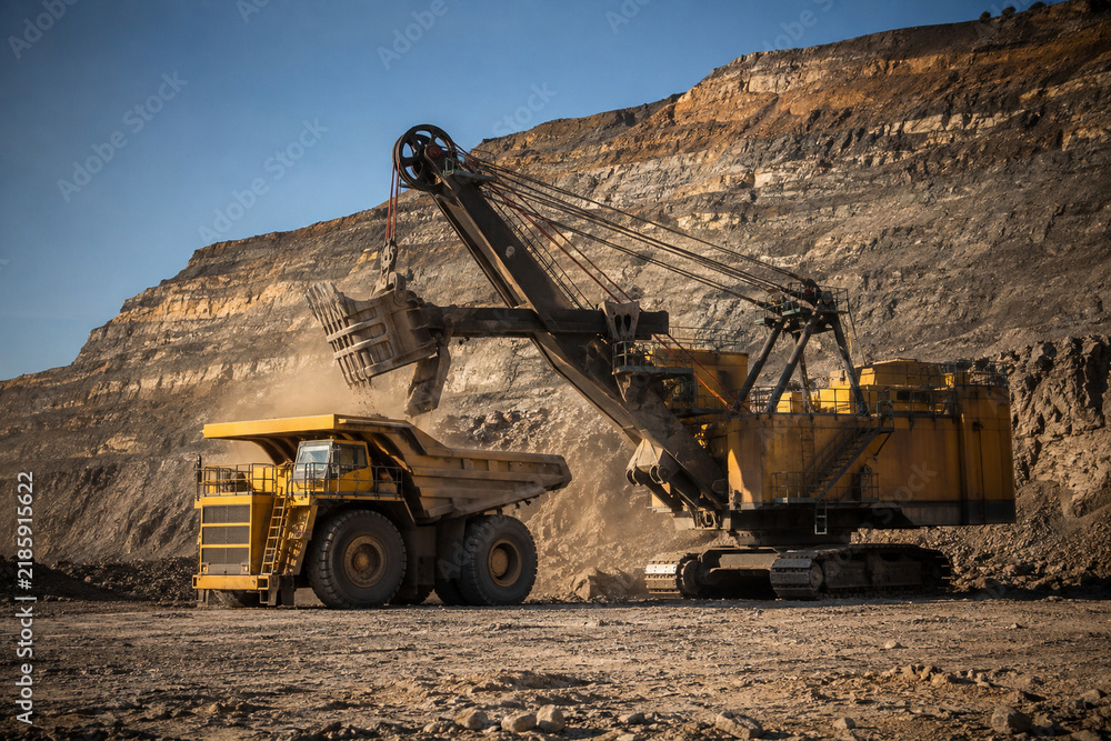 Fototapeta premium Mining Shovel Loading a Giant Haul Truck