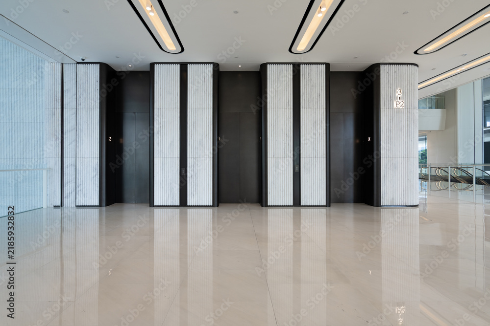 Obraz premium modern business office building elevator hall interior