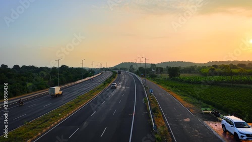 Scenic Highway Road Through Lush Green Landscape with Moving Traffic Mumbai Nagpur Highway