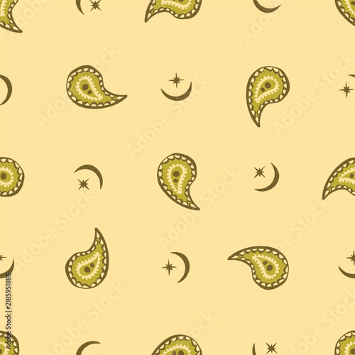 Seamless celestial paisley pattern with golden paisley teardrops, crescent moons and stars scattered across warm pale yellow background