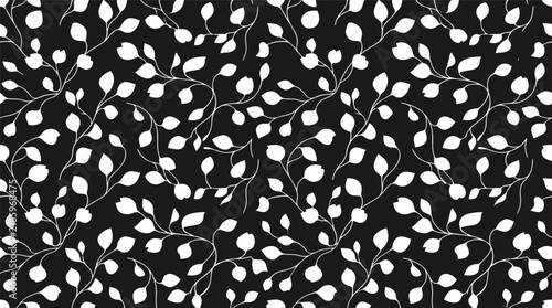 Monochrome seamless leaf pattern with white teardrop shapes on black surface.
