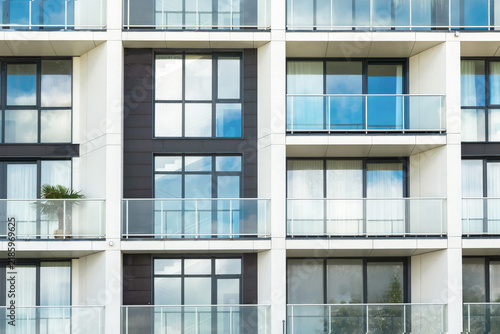 Modern apartment building facade pattern with balconies