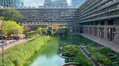 London iconic Brutalist concrete walkways Barbican Estate gardens apartments housing