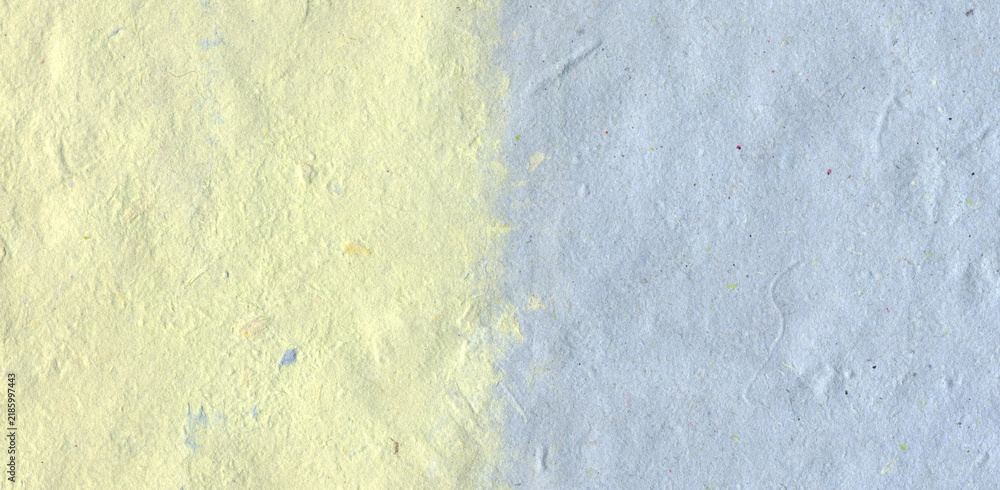 Fototapeta premium Pale Yellow and Powder Blue Recycled Paper Texture with Uneven Color Boundary
