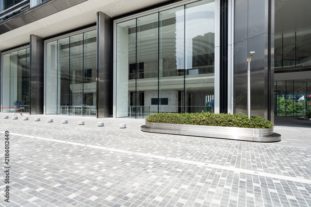 Obraz premium modern glass curtain wall building exterior