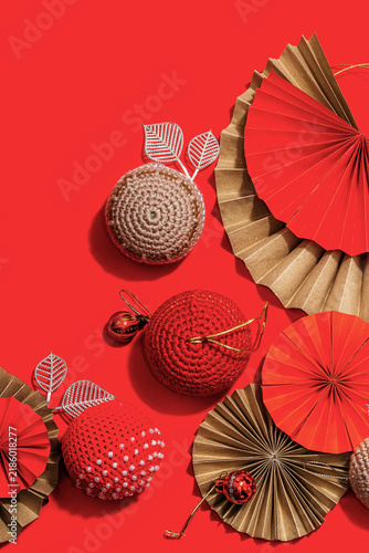 Happy Chinese New Year traditional concept. Oriental asian style paper fans on red background