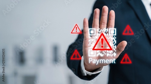 Businessman showing a hand gesture against a digital payment warning symbol with qr code with businessman makes