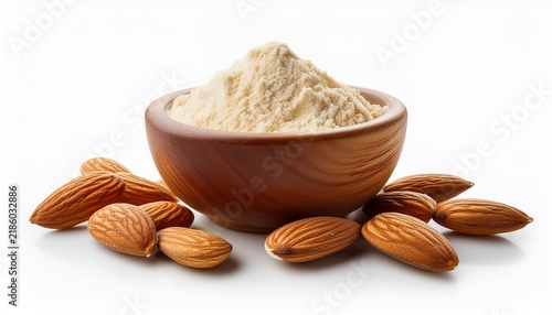 almond flour in wooden bowl with almonds on white background