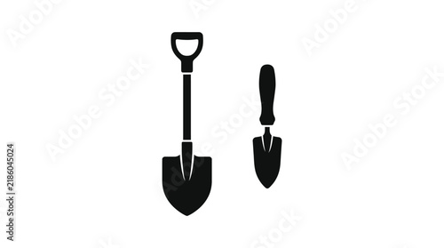 Two garden tools a shovel and trowel presented as a black silhouette on transparent background