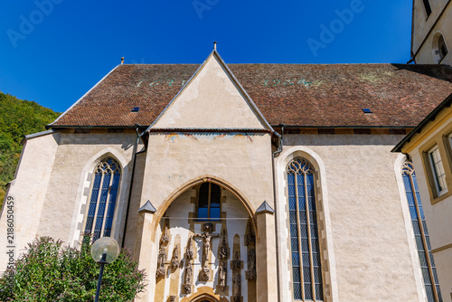 Konstfotografi Low angle view of Kloster Blaubeuren monastery church entrance with late Gothic