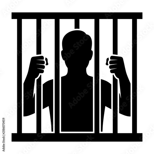 Принти на полотні Silhouette of prisoner behind jail bars symbolizing imprisonment