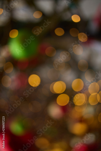  golden Christmas lights create large soft bokeh circles in the background, producing a cozy, magical holiday atmosphere