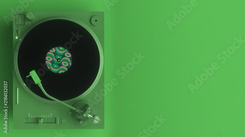 Top View of Spinning Vinyl on Futuristic Green Record Player
