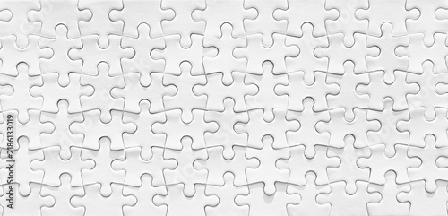 White puzzle background, blank seamless jigsaw pattern texture, conceptual background for business connection, solution and teamwork