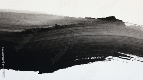 Abstract Black Ink Wash Brush Stroke Texture on White Paper Background