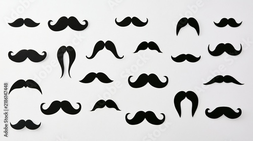Many different types of mustaches are displayed on a white background