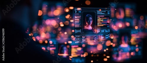 Futuristic digital interface displaying a female virtual identity profile with code and data screens, representing artificial intelligence, cybersecurity, digital identity, and advanced technology.