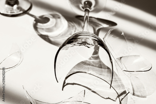 Fotografie Shattered Wine Glass Representing Failure Mistake and Consequences