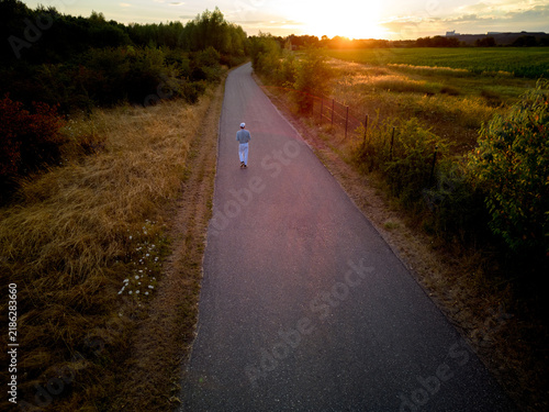Walking Path During Sunset in a Rural Area