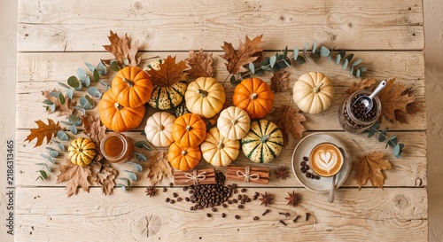 Autumn Flat Lay with Mini Pumpkins Coffee Latte Leaves and Spices on Wooden Table