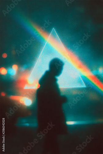 Mystical Silhouette of a Person in Profile Illuminated by a Vibrant Diagonal Rainbow Light Beam, Creative Film Grain Portrait