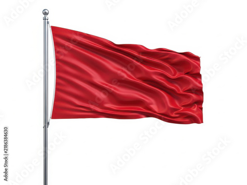 Bright red fabric flag waving on a tall silver metal pole