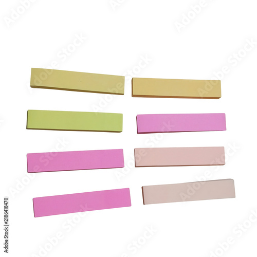 Eight rectangular paper strips in various pastel colors including yellow, pink, and peach, arranged in two columns on a clean white background surface isolated on a transparent background