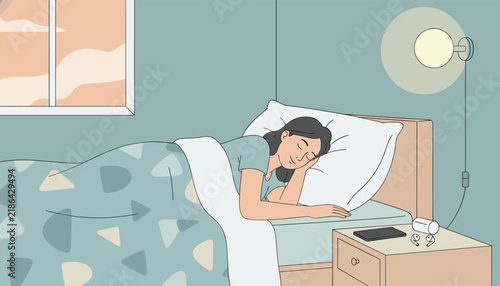 Young woman sleeping peacefully in her bed at home during the night with a bedside lamp on for a relaxing atmosphere.
