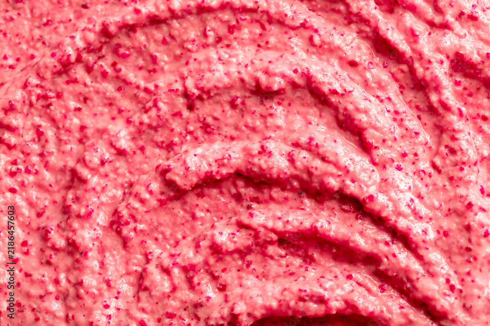 Obraz premium Fruit pink ice cream. Yogurt smoothie with fresh fruits and berries. Ice cream texture. Delicious sweet dessert close-up as background.