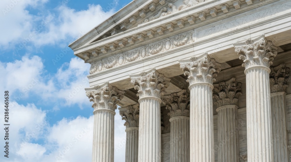 Obraz premium Neoclassical marble architecture with columns against a blue sky