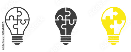 Foto Puzzle Lightbulb Idea: Three distinct lightbulb icons composed of puzzle pieces, symbolizing creativity, problem-solving, and the genesis of innovative thought