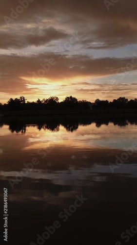 Beautiful Full Sunrise over Water Timelapse 4K Vertical Video