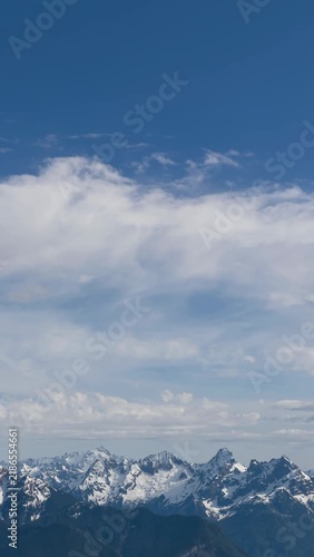 Majestic Snow-Capped Mountains Under a Vast Blue Sky in Beautiful British Columbia, Canada