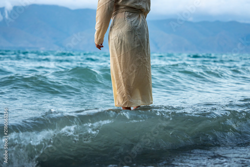 Fotografía Jesus walks on water, divine miracle, biblical scene.