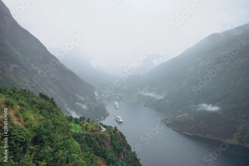 Bild auf Leinwand Wide view of Geirangerfjord in Norway with cruise ships