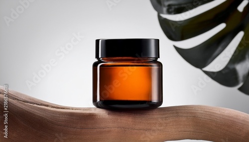 amber glass jar with black lid cosmetic packaging mockup