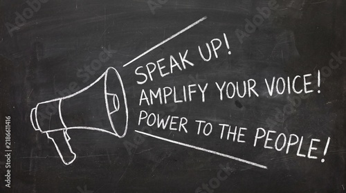 A white chalk illustration on a blackboard depicting a megaphone with sound lines projecting the phrases 