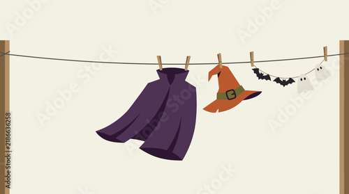 Halloween costumes hanging on clothesline with purple vampire cape witch hat and bat garland illustration
