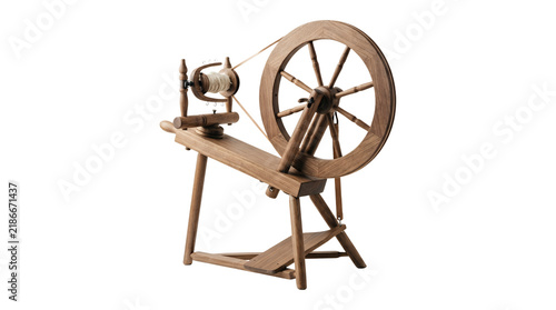 Vintage wooden spinning wheel for yarn making.
