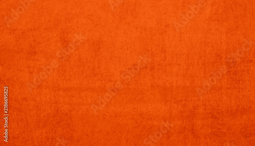 Vibrant orange texture with a matte finish and subtle tonal variations, ideal as a warm background for design, advertising, decor and creative compositions.