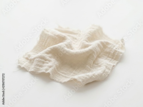 Soft white cotton cloth or napkin folded on a clean surface