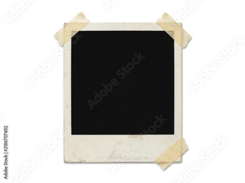 Vintage polaroid photo frame with adhesive tape isolated on white background